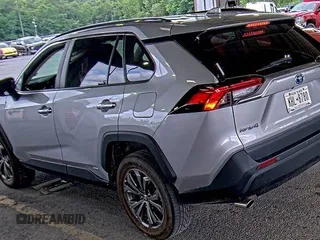 2022 Toyota RAV4 Hybrid XLE Premium with VIN 4T3B6RFV2NU084419, listed as a IAAI auction lot 42729518 with 76,607 mi miles and . Bid and sale history available at DreamBid. Image 6.