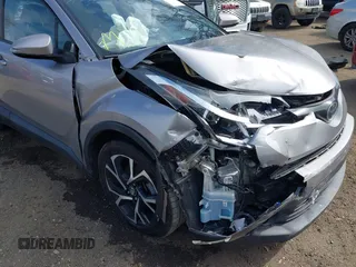2018 Toyota C-HR XLE with VIN NMTKHMBX6JR057321, listed as a IAAI auction lot 41894322 with 50,606 mi miles. Bid and sale history available at carsss.com. Image 6.