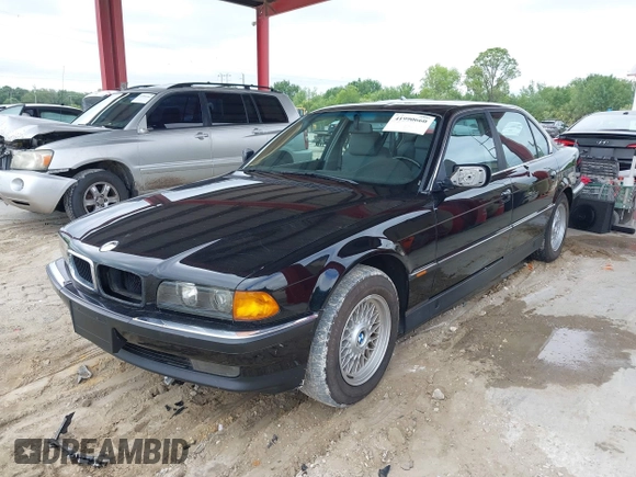 1997 BMW 7 Series 740il with VIN WBAGJ8324VDL43320, listed as a IAAI auction lot 41990660 with 193,998 mi miles. Bid and sale history available at carsss.com. Image 2.