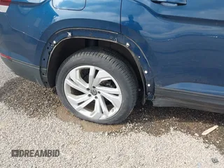2021 Volkswagen Atlas SE z VIN 1V2JR2CA9MC547054, wystawiony jako IAAI lot #42090923 z przebiegiem 40 011 mil mil oraz . Historia ofert i sprzedaży dostępna na DreamBid. Obrazek 18.