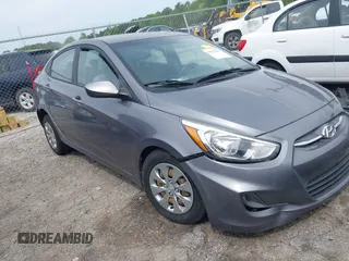 2016 Hyundai Accent SE z VIN KMHCT4AE0GU150548, wystawiony jako IAAI lot #42031911 z przebiegiem 134 916 mil mil oraz . Historia ofert i sprzedaży dostępna na DreamBid. Obrazek 1.