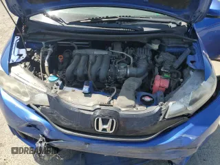2017 Honda Fit LX z VIN JHMGK5H52HS010064, wystawiony jako Copart lot #54091175 z przebiegiem 139 775 mil mil oraz Szkoda całkowita • Salvage title. Historia ofert i sprzedaży dostępna na DreamBid. Obrazek 11.