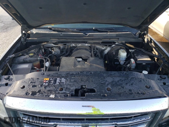 2014 GMC Sierra 1500 with VIN 1GTN1UEH7EZ171338, listed as a Copart auction lot 84943144 with 114,210 mi miles and Salvage Title. Bid and sale history available at DreamBid. Image 11.