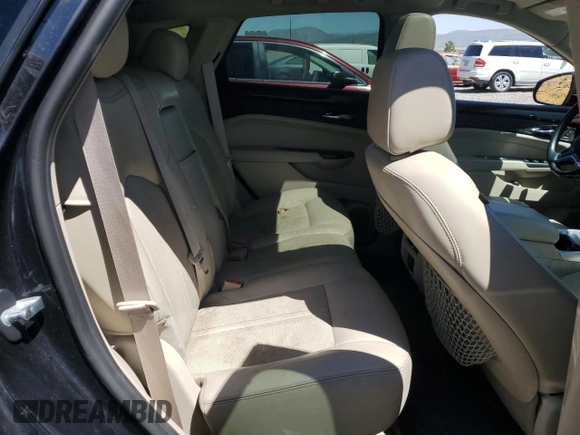 2013 Cadillac SRX Performance Collection z VIN 3GYFNHE37DS519391, wystawiony jako Copart lot #56307695 z przebiegiem 122 294 mil mil oraz Czysty tytuł • Clean title. Historia ofert i sprzedaży dostępna na DreamBid. Obrazek 10.