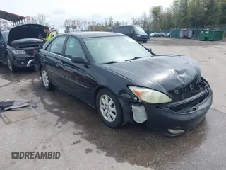 2004 Toyota Camry LE with VIN 4T1BF30K34U080477, listed as a IAAI auction lot 41956998 with 135,441 mi miles. Bid and sale history available at carsss.com. Image 1.