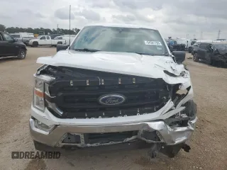 2022 Ford F-150 XL with VIN 1FTFW1E82NFA51713, listed as a Copart auction lot 54581755 with 69,966 mi miles and Salvage Title. Bid and sale history available at DreamBid. Image 5.