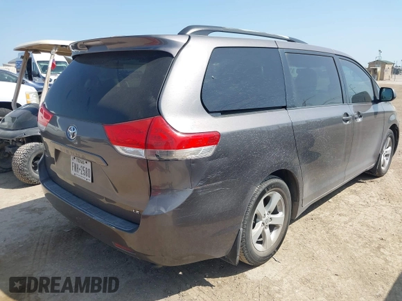 2012 Toyota Sienna LE AAS with VIN 5TDKK3DC8CS180967, listed as a IAAI auction lot 42215961 with 220,089 mi miles and . Bid and sale history available at DreamBid. Image 4.