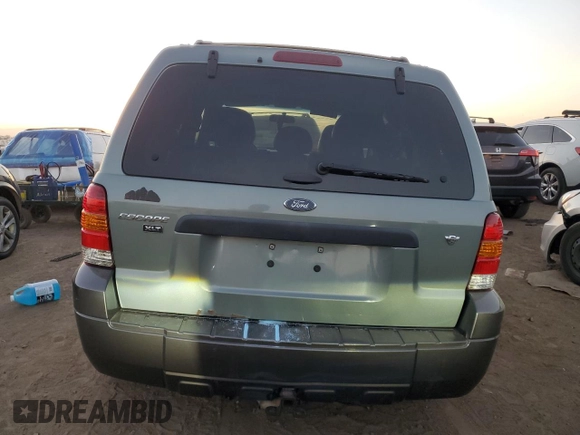 2005 Ford Escape XLT with VIN 1FMCU93105KD29752, listed as a Copart auction lot 73687754 with 199,362 mi miles and Salvage Title. Bid and sale history available at carsss.com. Image 6.