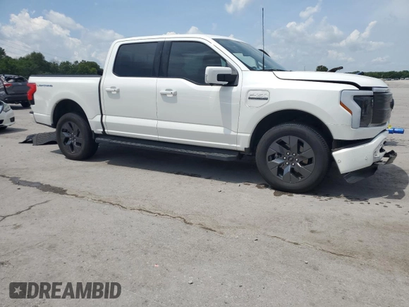 2022 Ford F-150 Lightning Pro with VIN 1FTVW1EL3NWG16146, listed as a Copart auction lot 65322785 with 68,928 mi miles and Salvage title. Bid and sale history available at DreamBid. Image 4.