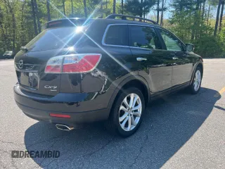 2011 Mazda CX-9 Grand Touring z VIN JM3TB3DV3B0302715, wystawiony jako Copart lot #56952095 z przebiegiem 181 177 mil mil oraz Czysty tytuł • Clean title. Historia ofert i sprzedaży dostępna na DreamBid. Obrazek 4.