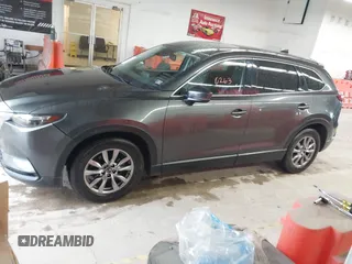 2017 Mazda CX-9 Touring with VIN JM3TCBCY1H0127229, listed as a IAAI auction lot 42320263 with 85,890 mi miles and . Bid and sale history available at DreamBid. Image 14.
