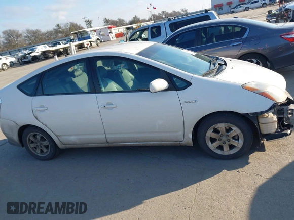 2008 Toyota Prius z VIN JTDKB20UX83457040, wystawiony jako IAAI lot #41626418 z przebiegiem 185 936 mil mil oraz . Historia ofert i sprzedaży dostępna na DreamBid. Obrazek 14.