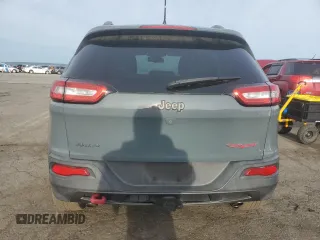 2014 Jeep Cherokee Trailhawk with VIN 1C4PJMBS3EW308706, listed as a Copart auction lot 58307975 with 90,530 mi miles and Salvage title. Bid and sale history available at DreamBid. Image 6.