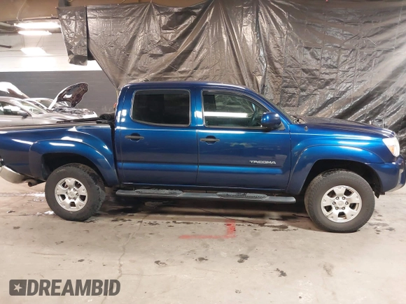 2014 Toyota Tacoma with VIN 3TMLU4EN4EM156933, listed as a IAAI auction lot 41197904 with 128,183 mi miles. Bid and sale history available at carsss.com. Image 13.
