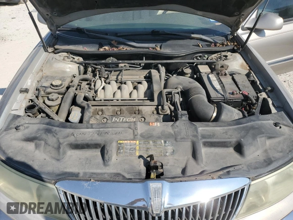 2002 Lincoln Continental with VIN 1LNHM97V32Y647800, listed as a Copart auction lot 75240874 with 71,689 mi miles and Salvage Title. Bid and sale history available at carsss.com. Image 11.