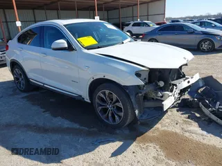 2016 BMW X4 xDrive28i z VIN 5UXXW3C59G0R19977, wystawiony jako IAAI lot #41840665 z przebiegiem 69 353 mil mil oraz . Historia ofert i sprzedaży dostępna na DreamBid. Obrazek 1.