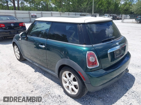 2010 MINI Hardtop with VIN WMWMF3C5XATZ23107, listed as a IAAI auction lot 42732300 with 100,747 mi miles and . Bid and sale history available at DreamBid. Image 3.