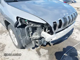 2015 Jeep Cherokee Latitude with VIN 1C4PJLCB8FW620336, listed as a IAAI auction lot 41634997 with 130,335 mi miles. Bid and sale history available at carsss.com. Image 19.