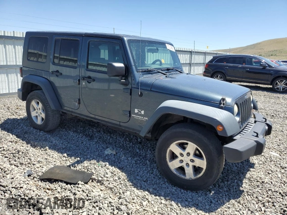 2008 Jeep Wrangler Unlimited X with VIN 1J4GA39168L509720, listed as a Copart auction lot 61014895 with 238,932 mi miles and Salvage title. Bid and sale history available at DreamBid. Image 4.