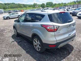 2017 Ford Escape Titanium with VIN 1FMCU0J99HUB23567, listed as a IAAI auction lot 42127795 with 93,056 mi miles. Bid and sale history available at carsss.com. Image 3.