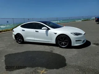 2021 Tesla Model S Plaid с VIN 5YJSA1E66MF453717, выставлен на аукционе Copart как лот 49330355 с пробегом 64 458 миль миль и Списание • Salvage title. История ставок и продаж доступна на DreamBid. Изображение 11.