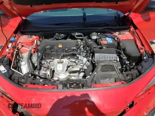 2023 Honda Civic Sport z VIN 2HGFE2F50PH502895, wystawiony jako Copart lot #56399125 z przebiegiem 14 021 mil mil oraz Szkody całkowita. Historia ofert i sprzedaży dostępna na DreamBid. Obrazek 11.
