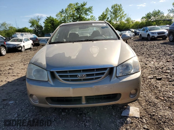 2006 Kia Spectra EX z VIN KNAFE121365269433, wystawiony jako Copart lot #56634735 z przebiegiem 86 551 mil mil oraz Szkoda całkowita • Salvage title. Historia ofert i sprzedaży dostępna na DreamBid. Obrazek 5.