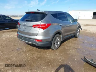 2016 Hyundai Santa Fe z VIN 5XYZTDLB7GG326076, wystawiony jako IAAI lot #41435551 z przebiegiem Nie podano mil oraz . Historia ofert i sprzedaży dostępna na DreamBid. Obrazek 4.