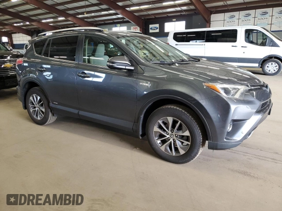 2016 Toyota RAV4 Hybrid XLE with VIN JTMRJREV0GD035203, listed as a Copart auction lot 54300225 with 153,369 mi miles and Salvage Title. Bid and sale history available at carsss.com. Image 4.