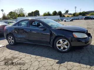2005 Pontiac G6 GT z VIN 1G2ZH528754113674, wystawiony jako Copart lot #56992545 z przebiegiem 165 598 mil mil oraz Szkoda całkowita • Salvage title. Historia ofert i sprzedaży dostępna na DreamBid. Obrazek 4.