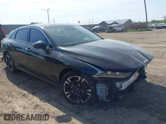 2023 Kia K5 GT-Line z VIN 5XXG64J22PG186976, wystawiony jako IAAI lot #42241886 z przebiegiem 39 502 mil mil oraz . Historia ofert i sprzedaży dostępna na DreamBid. Obrazek 1.