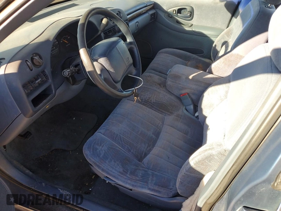 1997 Chevrolet Lumina LS with VIN 2G1WL52M0V1100215, listed as a Copart auction lot 78924694 with 200,402 mi miles and Salvage Title. Bid and sale history available at DreamBid. Image 7.