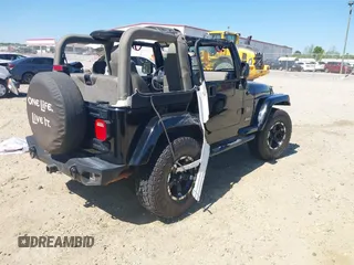 2004 Jeep Wrangler Sahara with VIN 1J4FA59S74P801296, listed as a IAAI auction lot 42049291 with 152,208 mi miles and . Bid and sale history available at DreamBid. Image 4.