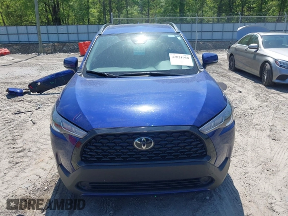 2023 Toyota Corolla Cross LE with VIN 7MUCAAAG8PV065431, listed as a IAAI auction lot 42031958 with 25,000 mi miles and . Bid and sale history available at DreamBid. Image 13.