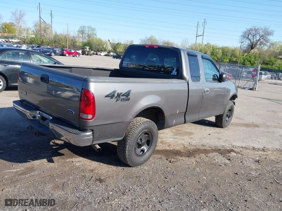 2004 Ford F-150 Heritage XL with VIN 2FTRX18W34CA97890, listed as a IAAI auction lot 42060361 with 177,385 mi miles. Bid and sale history available at carsss.com. Image 4.