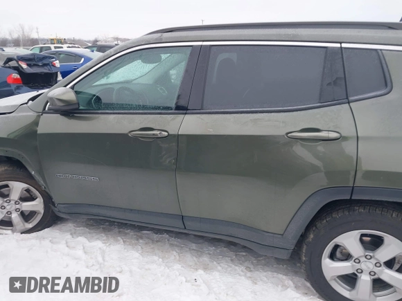 2018 Jeep Compass Altitude with VIN 3C4NJDBB1JT479462, listed as a IAAI auction lot 41276119 with 58,895 mi miles and . Bid and sale history available at carsss.com. Image 14.