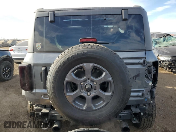 2024 Ford Bronco Big Bend z VIN 1FMDE7BH9RLA85832, wystawiony jako Copart lot #86171994 z przebiegiem 1 196 mil mil oraz Szkoda całkowita • Salvage title. Historia ofert i sprzedaży dostępna na DreamBid. Obrazek 6.