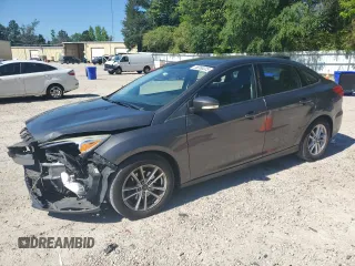 2015 Ford Focus SE with VIN 1FADP3F22FL276278, listed as a Copart auction lot 58386225 with 144,991 mi miles and Salvage title. Bid and sale history available at DreamBid. Image 1.