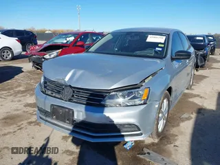 2015 Volkswagen Jetta SE z VIN 3VWD07AJ6FM326731, wystawiony jako IAAI lot #41066250 z przebiegiem 63 242 mil mil oraz . Historia ofert i sprzedaży dostępna na DreamBid. Obrazek 2.