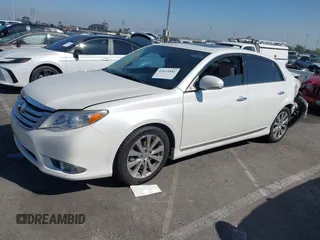 2012 Toyota Avalon with VIN 4T1BK3DB1CU469574, listed as a IAAI auction lot 41633881 with 128,425 mi miles and . Bid and sale history available at DreamBid. Image 2.