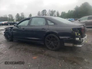 2022 Audi S8 с VIN WAULSAF89NN007255, выставлен на аукционе Copart как лот 57654725 с пробегом 14 904 миль миль и Списание • Salvage title. История ставок и продаж доступна на DreamBid. Изображение 2.