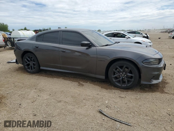 2021 Dodge Charger R/T with VIN 2C3CDXCT6MH682145, listed as a Copart auction lot 57914195 with 49,202 mi miles and Salvage title. Bid and sale history available at DreamBid. Image 4.