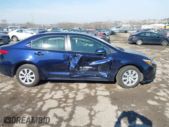2023 Toyota Corolla Hybrid LE with VIN JTDBCMFE7PJ005985, listed as a IAAI auction lot 41574856 with 31,568 mi miles. Bid and sale history available at carsss.com. Image 13.