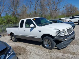 2001 Ford F-150 XL z VIN 1FTRX17L61NB26764, wystawiony jako IAAI lot #42049452 z przebiegiem 242 585 mil mil oraz . Historia ofert i sprzedaży dostępna na DreamBid. Obrazek 14.