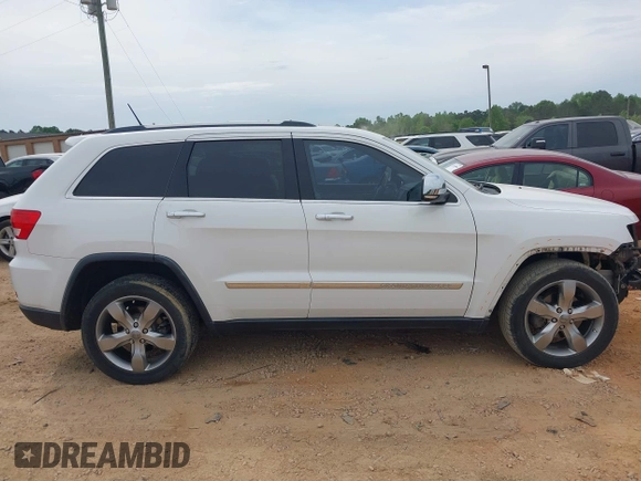 2013 Jeep Grand Cherokee Overland with VIN 1C4RJECGXDC621227, listed as a IAAI auction lot 42098042 with 194,232 mi miles and . Bid and sale history available at DreamBid. Image 13.