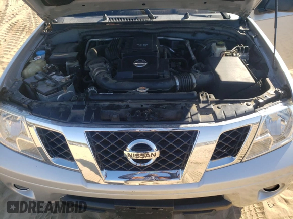 2015 Nissan Frontier S with VIN 1N6AD0EV0FN713325, listed as a Copart auction lot 62076541 with 40,289 mi miles and Salvage title. Bid and sale history available at DreamBid. Image 7.