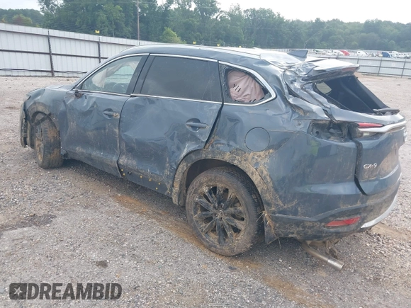 2021 Mazda CX-9 Grand Touring with VIN JM3TCADY2M0509286, listed as a IAAI auction lot 39976279 with 93,588 mi miles and . Bid and sale history available at DreamBid. Image 3.