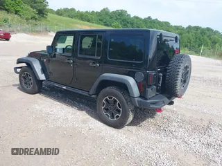 2017 Jeep Wrangler Unlimited Rubicon Recon z VIN 1C4HJWFG4HL507601, wystawiony jako IAAI lot #42258921 z przebiegiem 106 122 mil mil oraz . Historia ofert i sprzedaży dostępna na DreamBid. Obrazek 3.