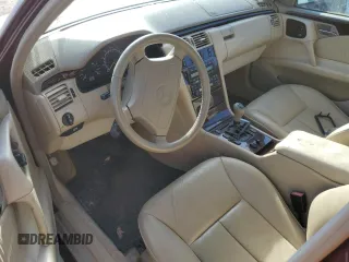 1998 Mercedes-Benz E with VIN WDBJF70F1WA503781, listed as a Copart auction lot 77284784 with Not Provided miles and Clean Title. Bid and sale history available at DreamBid. Image 8.