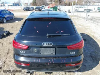 2016 Audi Q3 Premium Plus with VIN WA1EFCFS1GR011801, listed as a IAAI auction lot 41691273 with 126,554 mi miles. Bid and sale history available at carsss.com. Image 16.